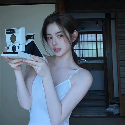 桃花含露又春风
